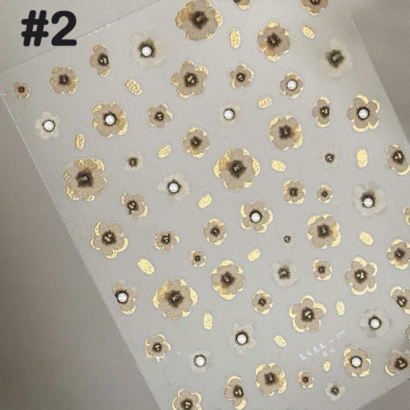 Vintage black and gold embossed 3D flower nail stickers with irregular blooming design