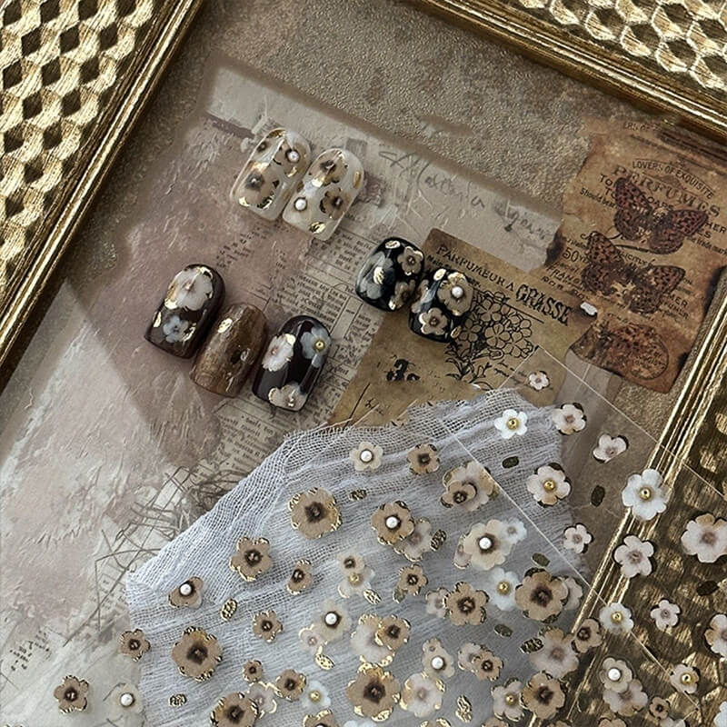 Vintage black and gold embossed 3D flower nail stickers with irregular blooming design
