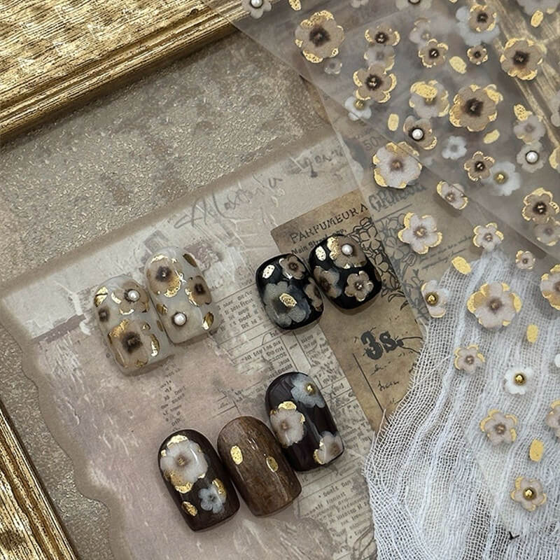 Vintage black and gold embossed 3D flower nail stickers with irregular blooming design