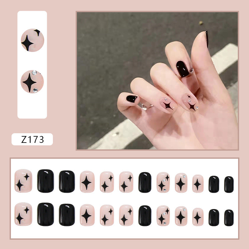 #111 Black star Design Short Length Press on Nail Squoval Shape