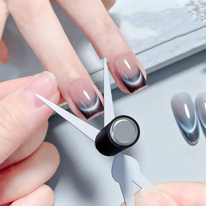 Double-ended French nail magnet tool for creating cat eye and iron strip effects